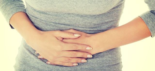 person touching stomach
